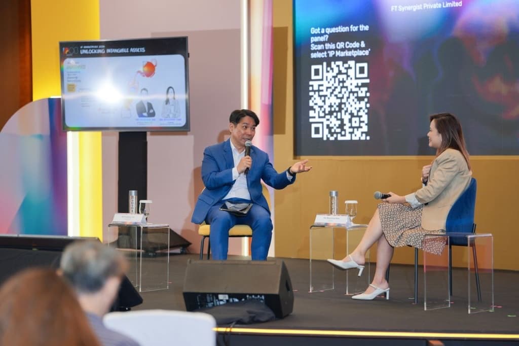 Frederick Tan and Rosemary Kwa speaking on stage at IPOS IP Week 2026 Marina Bay Sands